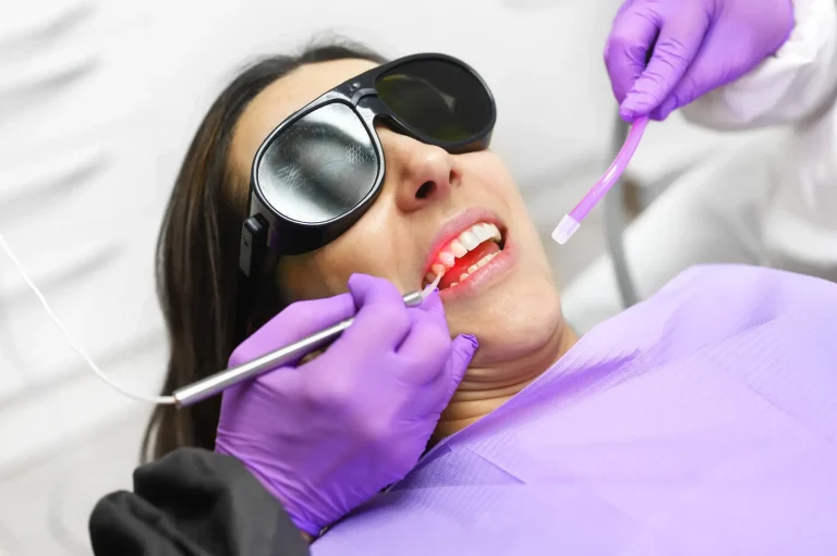 A patient receiving laser gum treatment